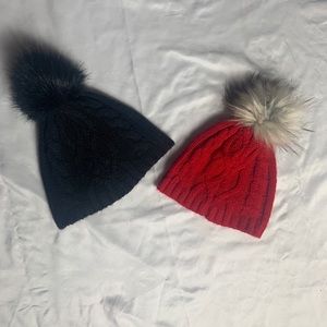 Two black and red matching hats.